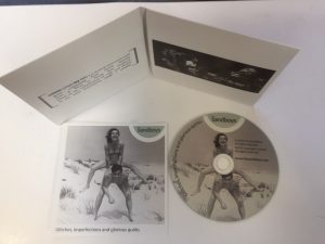 card lancing pack with cd with woman and man in swimming costumes and a booklet