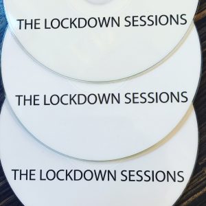 White cd disc with words printed in black LOCKDOWN music recorded during covid 19 virus